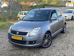 Suzuki Swift - Lees tekst 1.3 Base airco leder