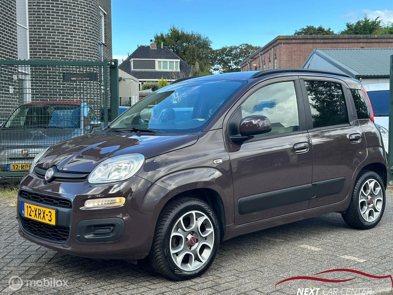 Fiat Panda - 0.9 TwinAir Lounge Airco/Nav/Trekhaak - AutoWereld.nl