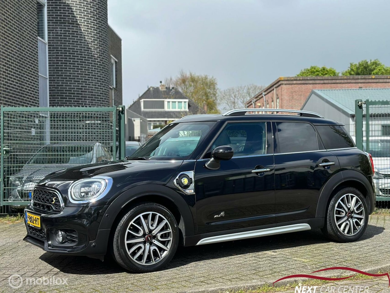 MINI Countryman - COOPER SE ALL4 2.0 Cooper S E ALL4 Chili JCW Pano - AutoWereld.nl