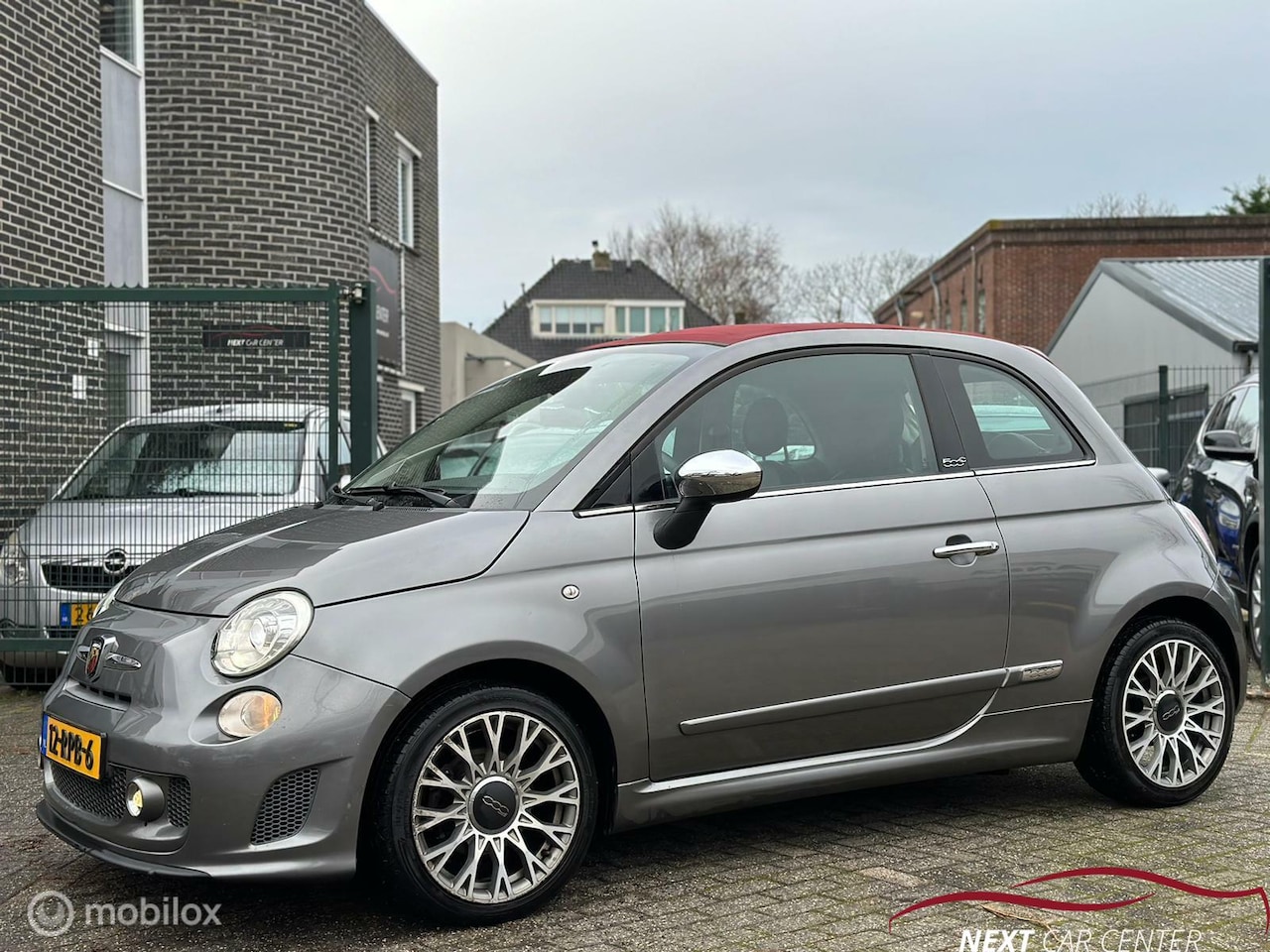 Fiat 500 C - 0.9 TwinAir Rock Abarth uitgevoerd! - AutoWereld.nl