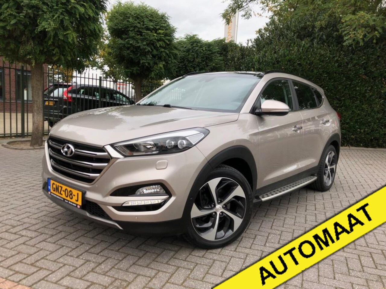 Hyundai Tucson - 4WD 1.6 AUTOMAAT, Clima, Cruise Control, Navigatie, Panoramadak, Achteruitrijcamera, Leder - AutoWereld.nl