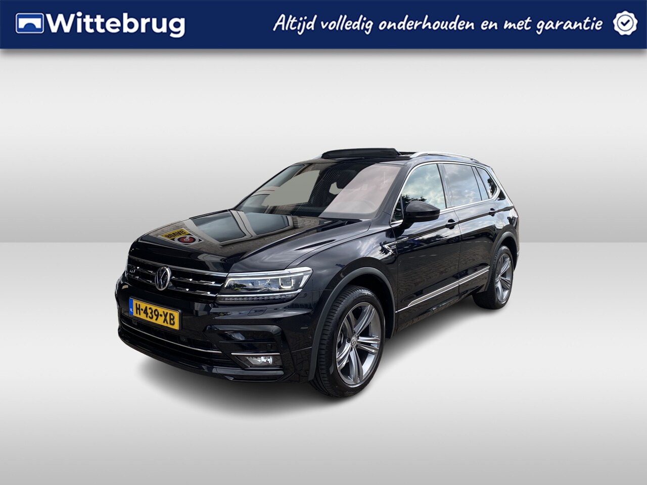 Volkswagen Tiguan Allspace - 1.5 TSI R-Line 7p. / AUTOMAAT/ TREKHAAK/ PANO/ CAMERA/ PARK. SENSOREN/ LED/ DODE HOEK/ ERG - AutoWereld.nl