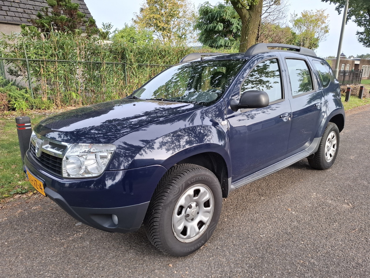 Dacia Duster - 1.6 Lauréate 2wd | Airco | Trekhaak - AutoWereld.nl