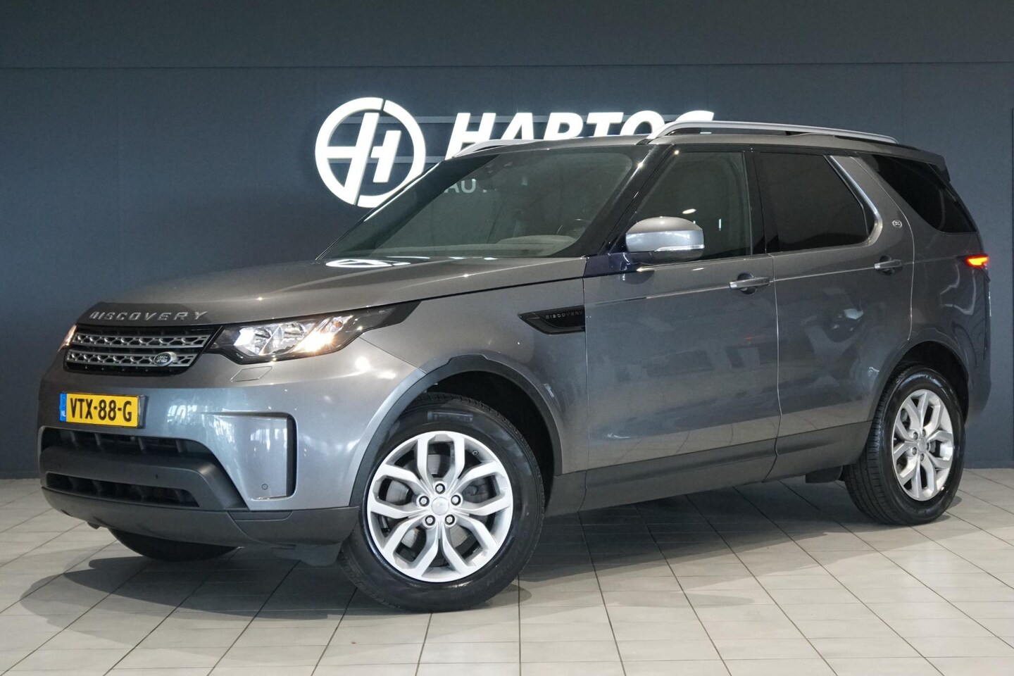 Land Rover Discovery - 2.0 Sd4 / GRIJS KENTEKEN / TREKHAAK - AutoWereld.nl