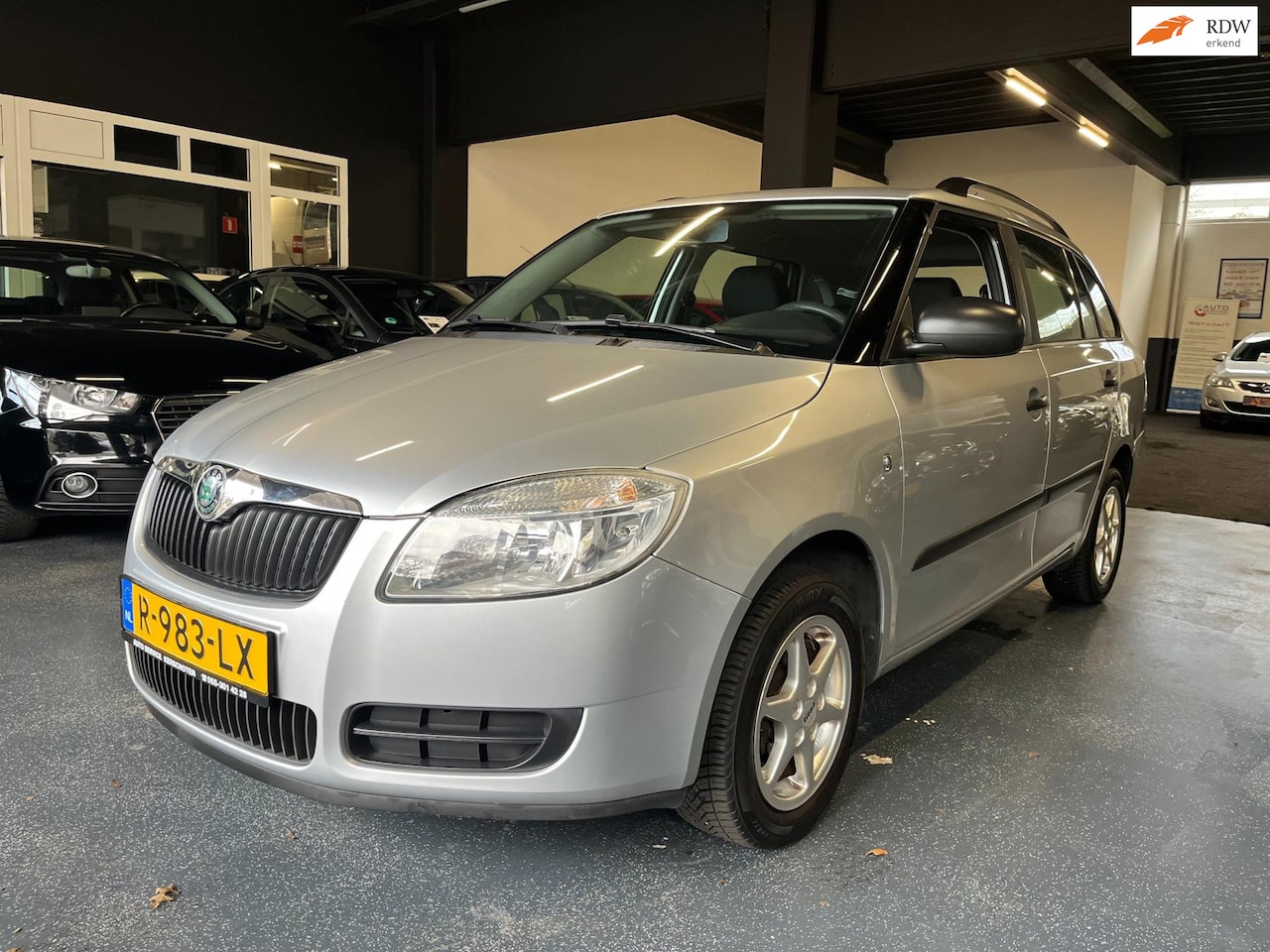 Skoda Fabia Combi - 1.2-12V Comfort * ELEKTR. RAMEN|AIRCO|LM. VELGEN|STUURBEKR. * - AutoWereld.nl