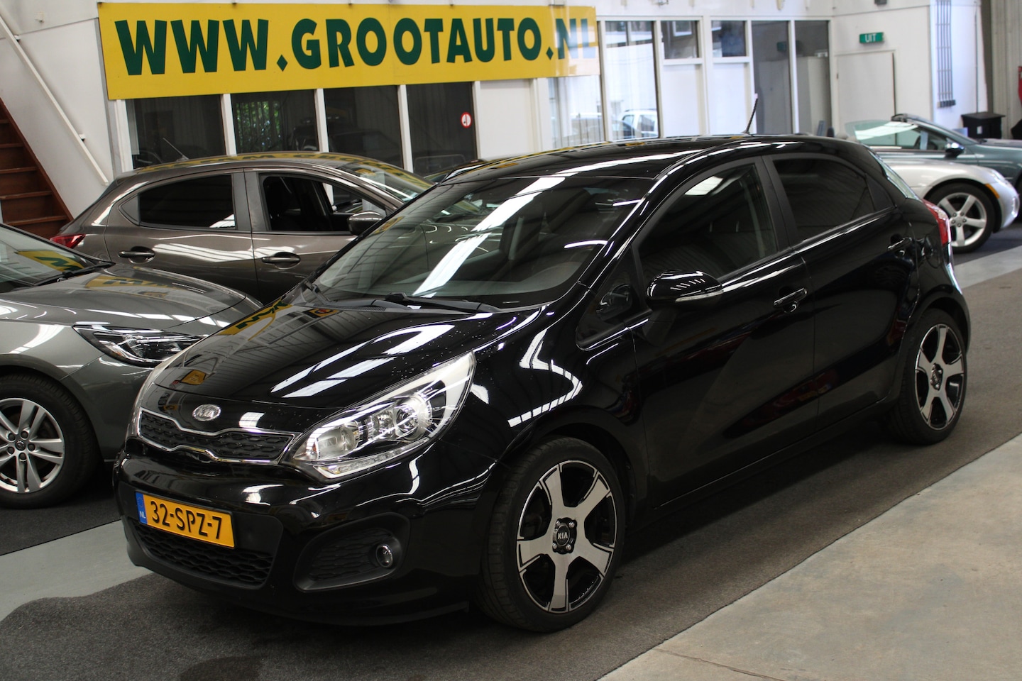 Kia Rio - 1.2 CVVT Super Pack Airco, Cruise control, Isofix - AutoWereld.nl