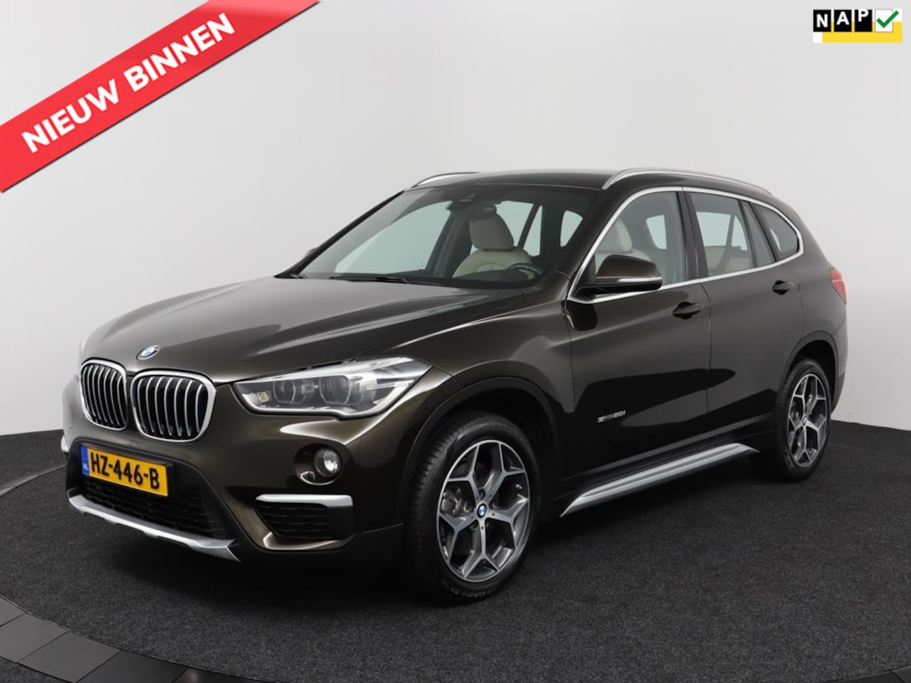 BMW X1 - SDrive 2.0i 192Pk Aut-8 | Clima | Leder | Cruise | Head-up display | Stoelverw. | Xenon | - AutoWereld.nl