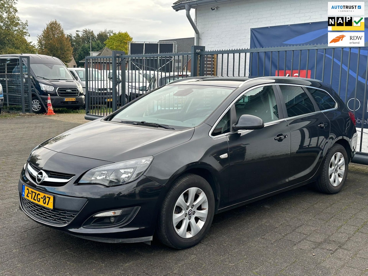 Opel Astra Sports Tourer - 1.4 Turbo Business + / AIRCO / CRUISE CONTROL / TREKHAAK - AutoWereld.nl