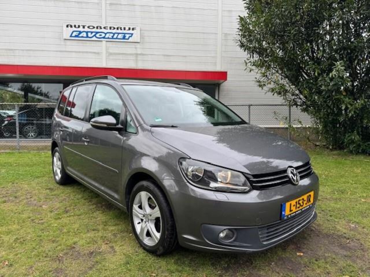 Volkswagen Touran - 1.4TSI 140PK DSG COMFORTLINE/NAV/THAAK/PDC - AutoWereld.nl