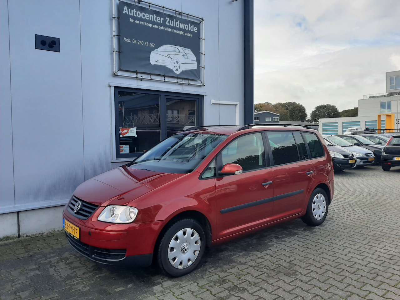 Volkswagen Touran - 1.6-16V FSI Athene clima cruise 7 pers - AutoWereld.nl