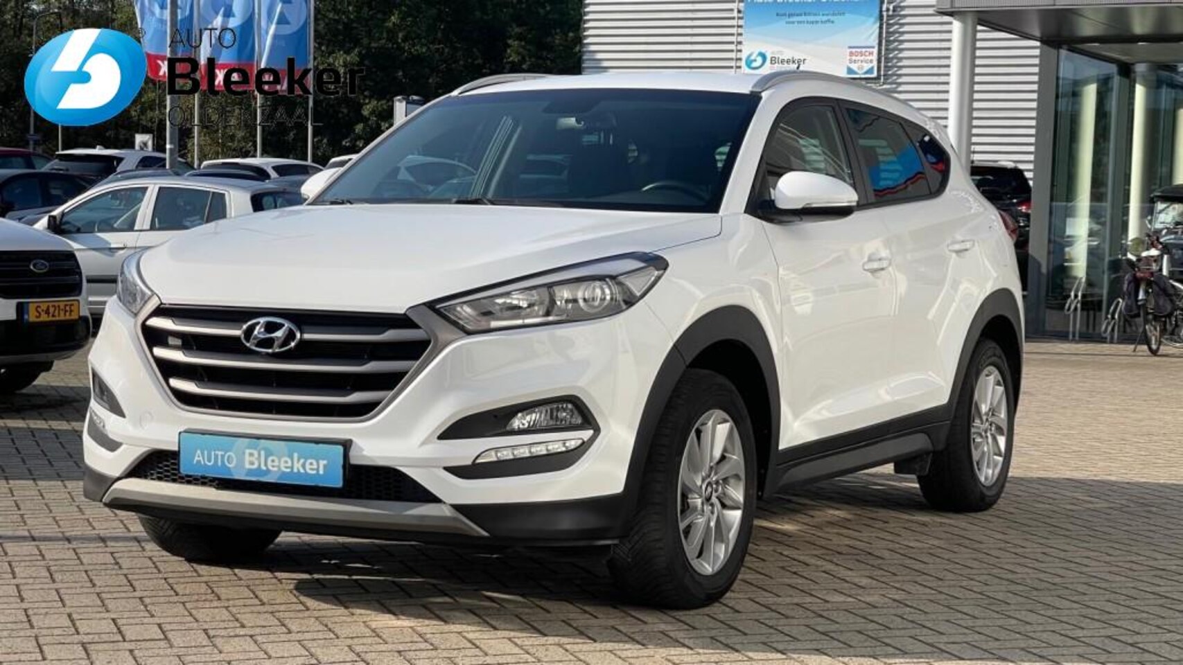 Hyundai Tucson - 1.6 GDI I-Motion Airco Cruise Parksensor stoel/stuur verwarmd - AutoWereld.nl