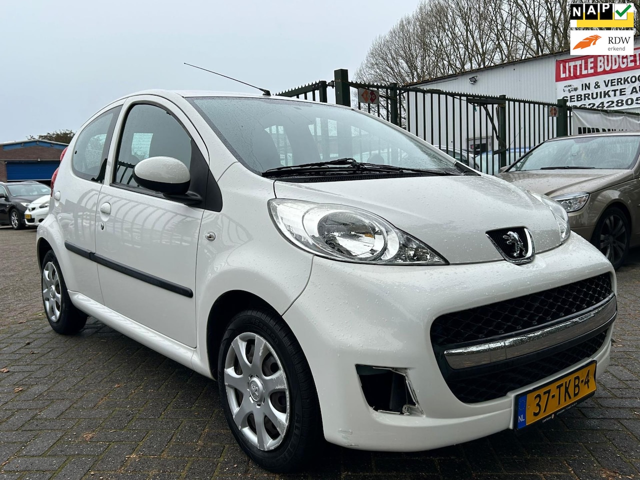 Peugeot 107 - 1.0-12V XS unike km org nl auto airco elektrische ramen cv op afs - AutoWereld.nl