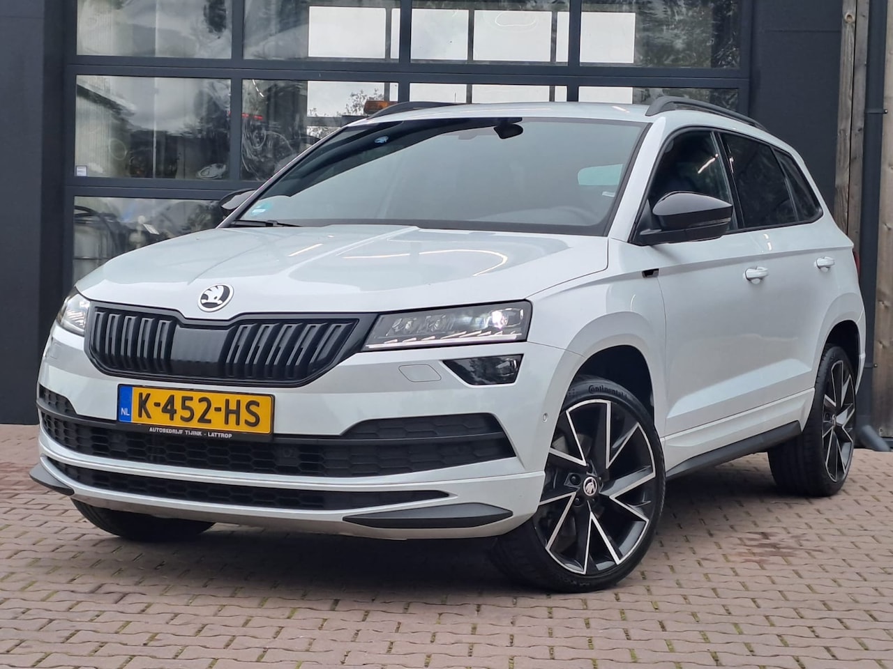 Skoda Karoq - 1.5 TSI ACT Sportline Business | LED | Virtual | Trekhaak | Stoel- & stuurverwarming | Nav - AutoWereld.nl