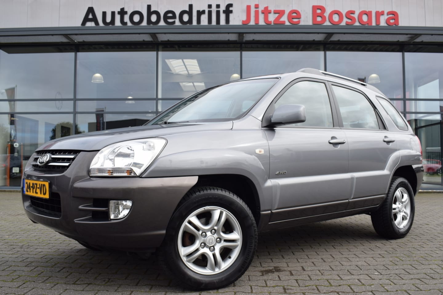 Kia Sportage - 2.7 V6 Automaat Adventure 4WD Half Leder | ECC | JVC Audio | 16 Inch LMV | Isofix - AutoWereld.nl