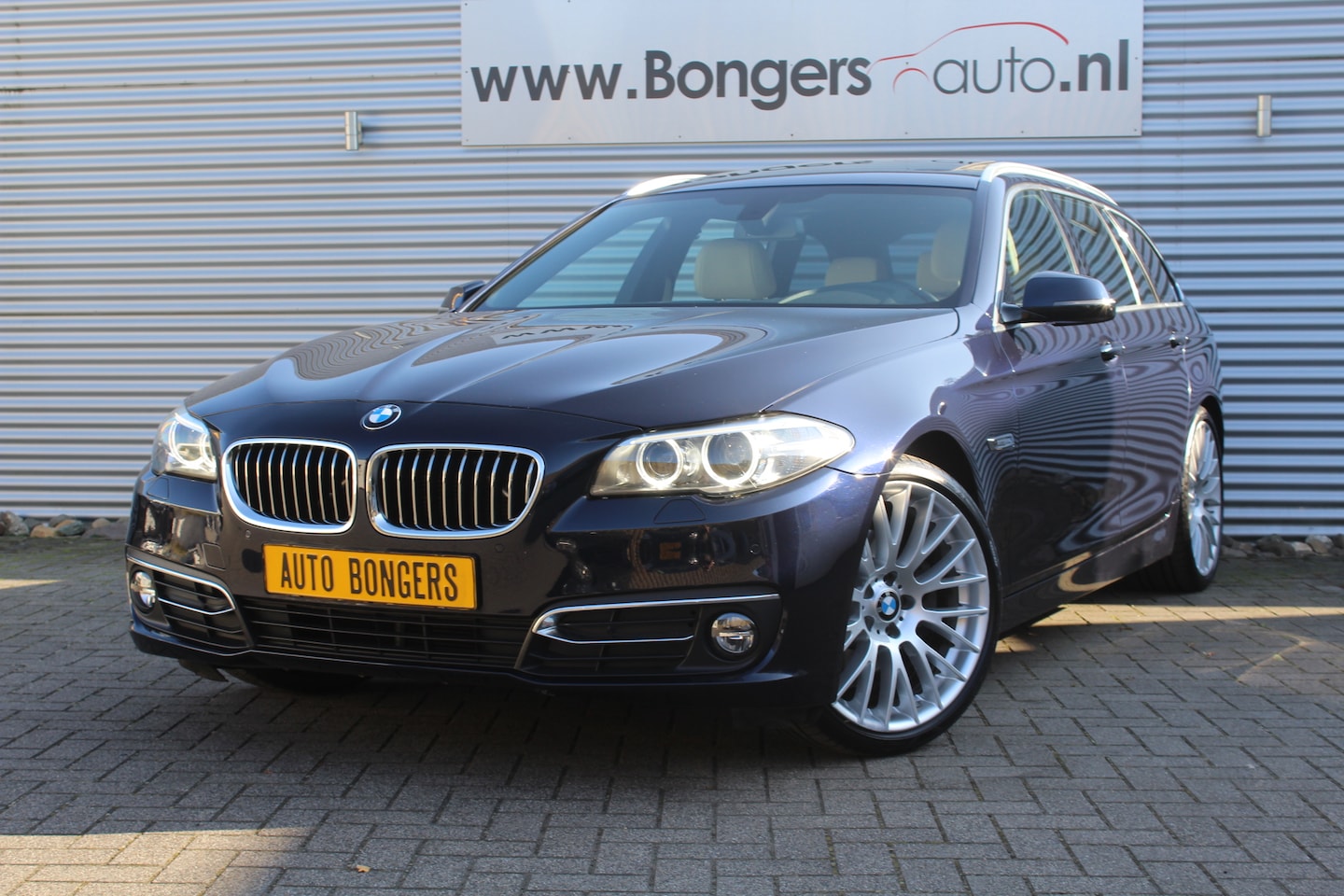 BMW 5-serie Touring - 520i Luxury Edition - AutoWereld.nl