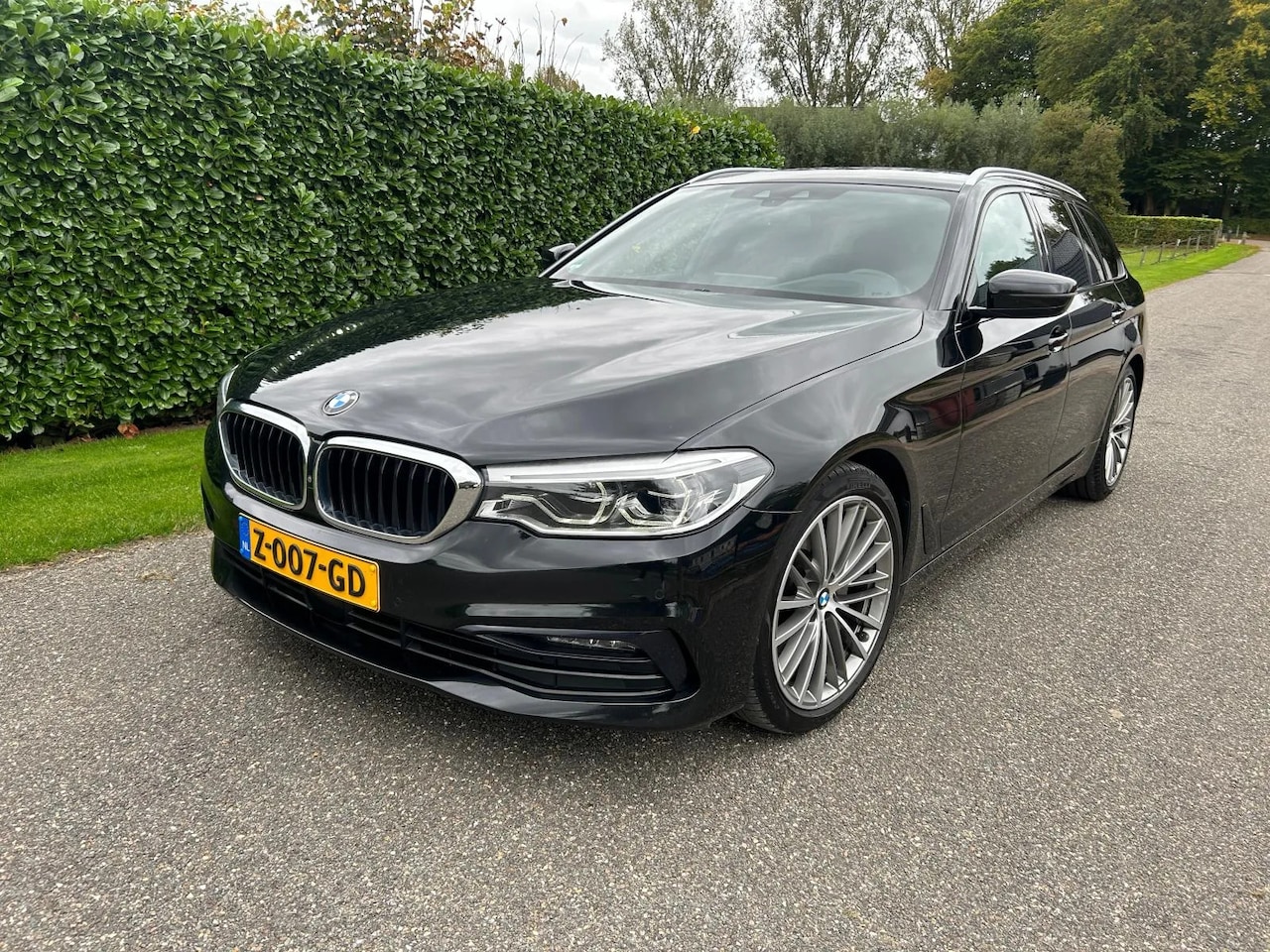 BMW 5-serie Touring - 520d Sport xDrive ADP Cruis Harman VOL! - AutoWereld.nl