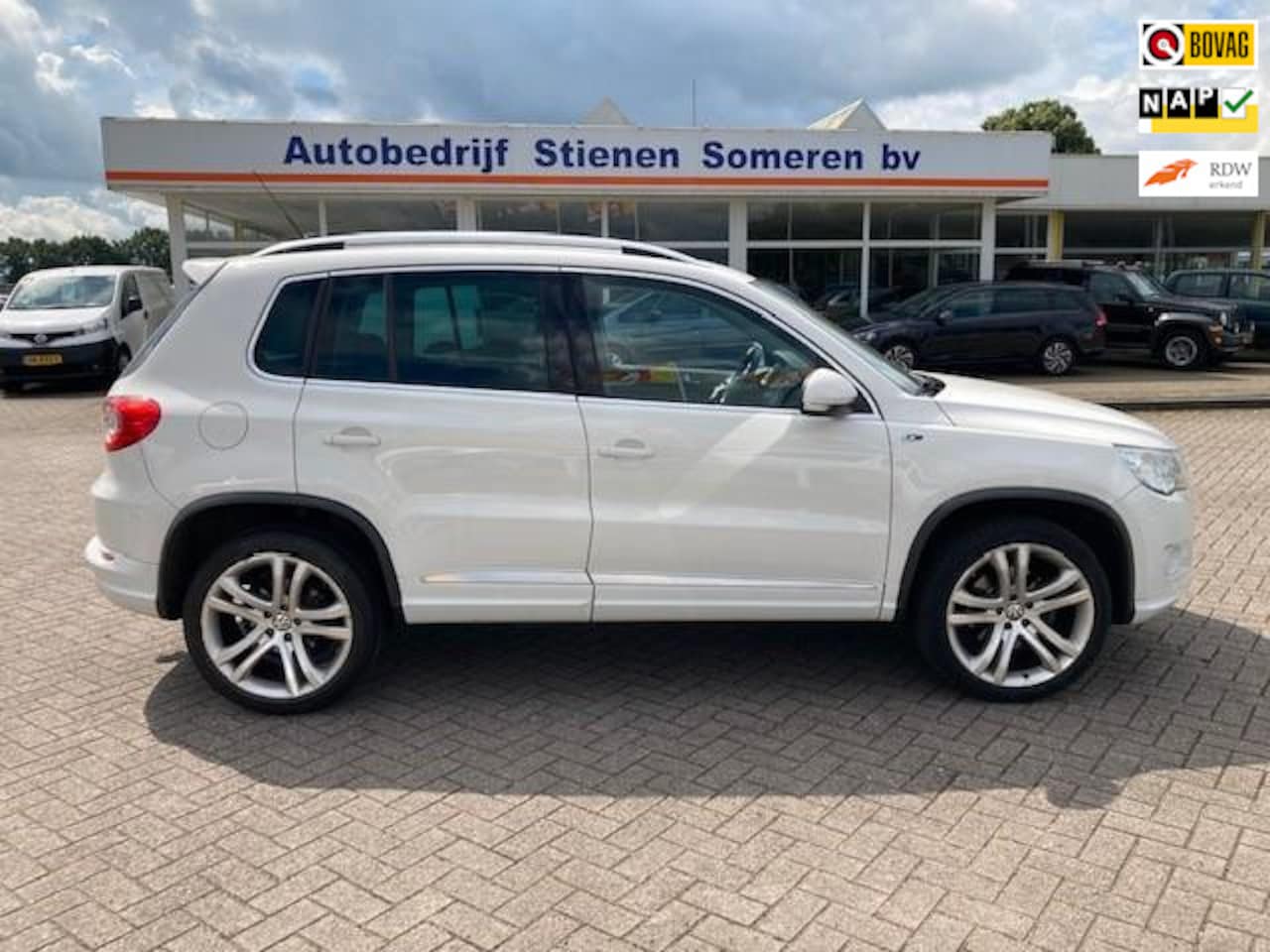 Volkswagen Tiguan - 2.0 TDI Comfort&Design 4Motion R-line - AutoWereld.nl