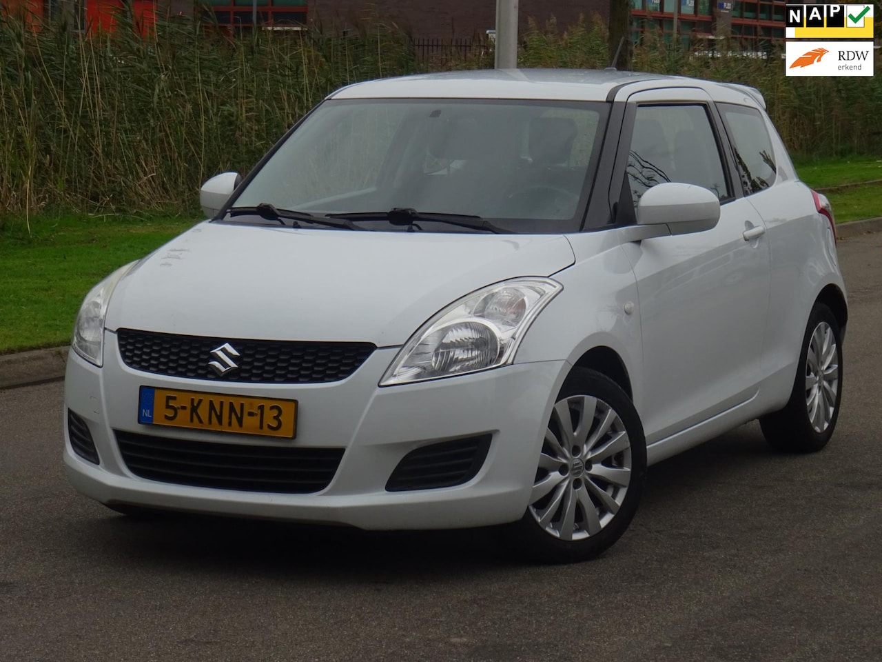 Suzuki Swift - 1.2 Bandit EASSS BJ2013 NAP/AIRCO/CRUISE/APK - AutoWereld.nl