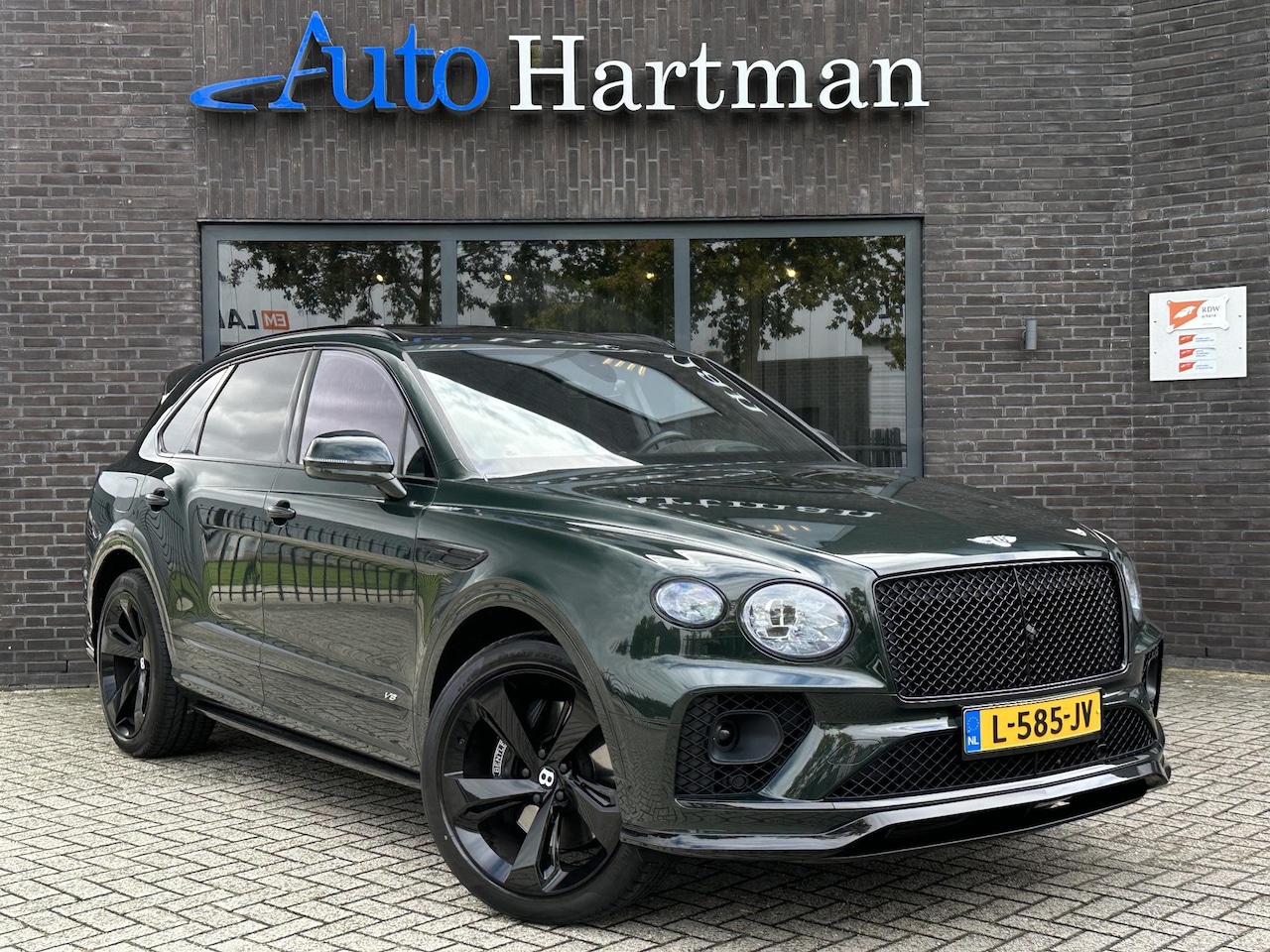 Bentley Bentayga - 4.0 V8 Mulliner Carbon | Koelbox | Touring | Massage - AutoWereld.nl