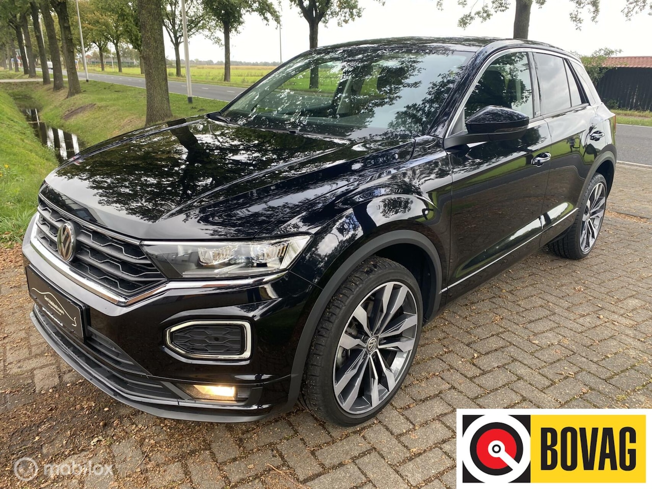 Volkswagen T-Roc - 1.5 TSI I R line I 19 inch I navigatie I - AutoWereld.nl