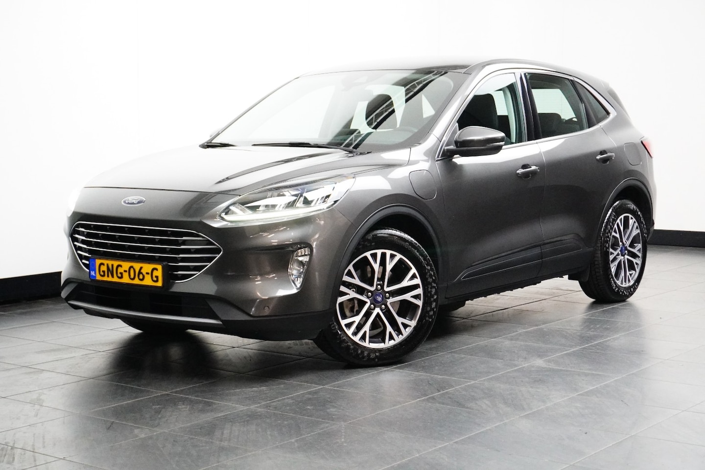 Ford Kuga - 2.5PHEV TITANIUM | TREKHAAK | WINTERPACK | 18'' LMV | STANDVERWARMING | CARPLAY + ANDROID - AutoWereld.nl