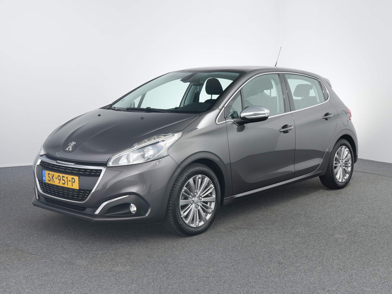 Peugeot 208 - 1.2 PureTech Blue Lease Executive | Cruise | Clima | Navigatie | Camera | - AutoWereld.nl