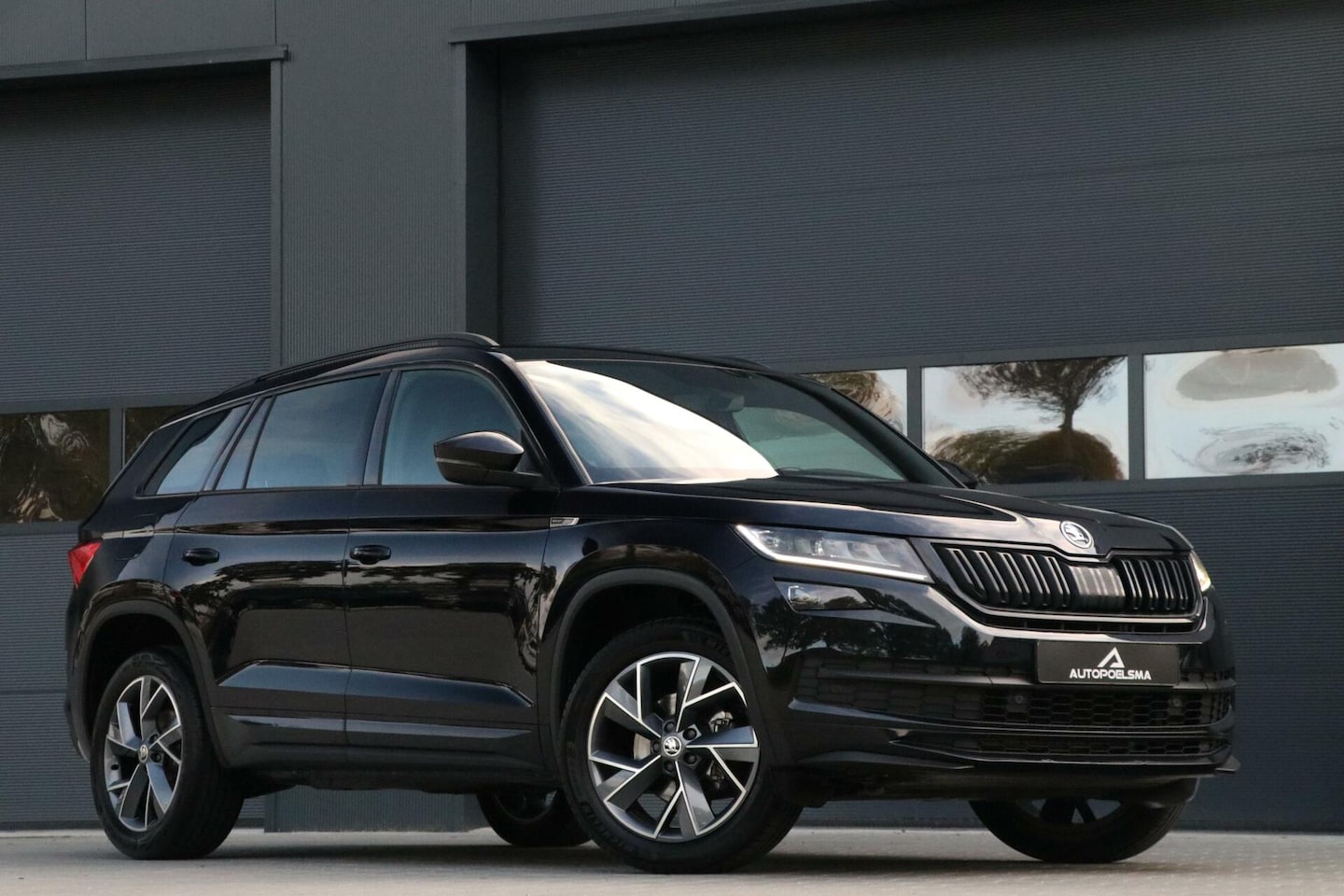 Skoda Kodiaq - 1.5 TSI Sportline Virtual Dash Sportzetels Memory Camera AppleCarplay Blackline 19'Inch Fr - AutoWereld.nl