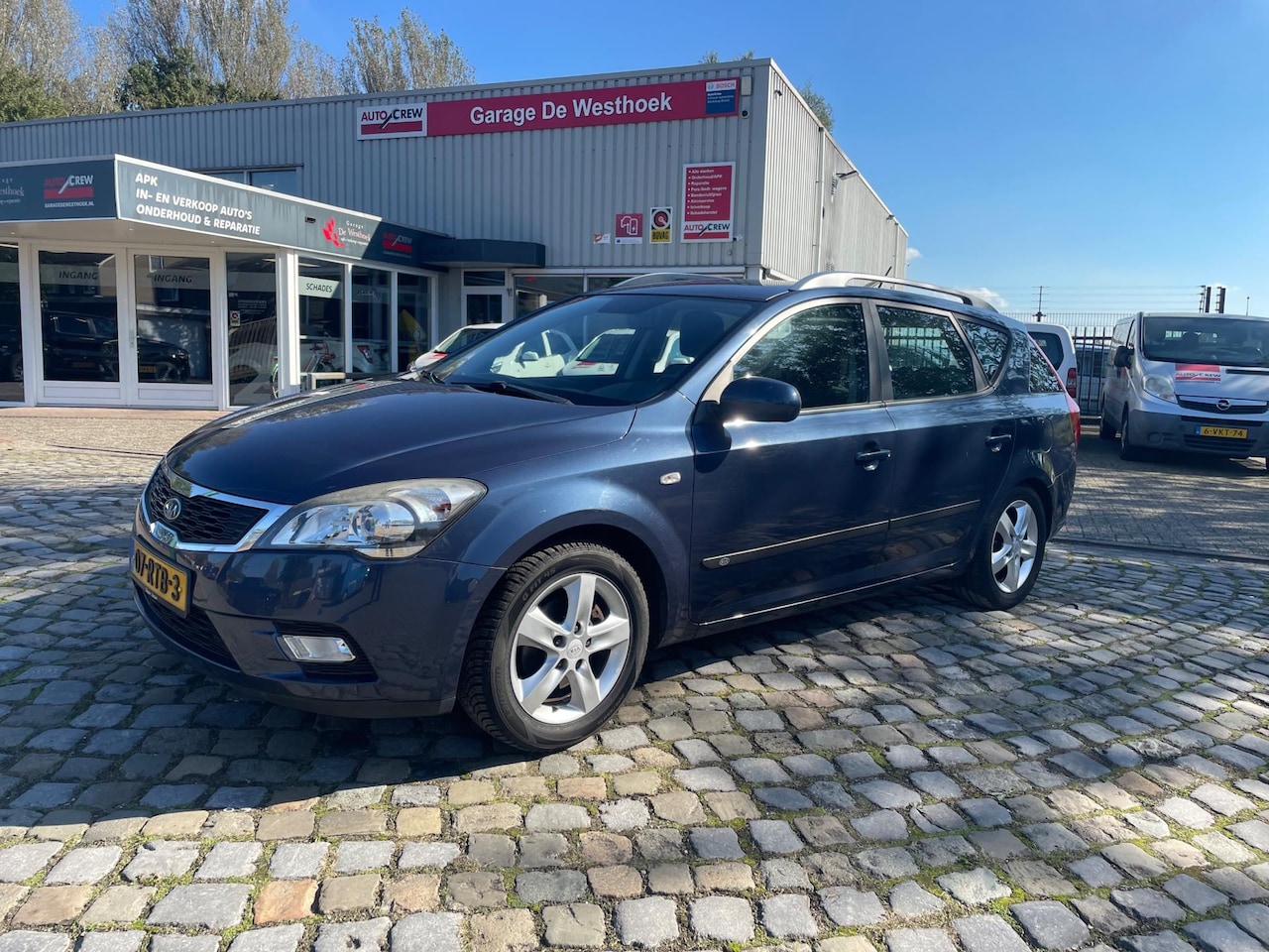 Kia Cee'd Sporty Wagon - 1.4 CVVT Seven 1.4 CVVT Seven - AutoWereld.nl