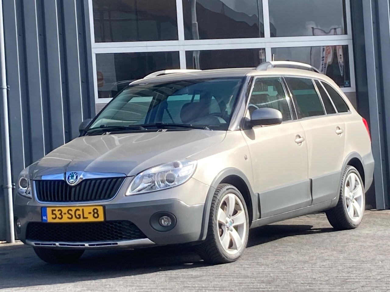 Skoda Fabia Combi - 1.2 TSI Scout Navigatie Climate controle - AutoWereld.nl