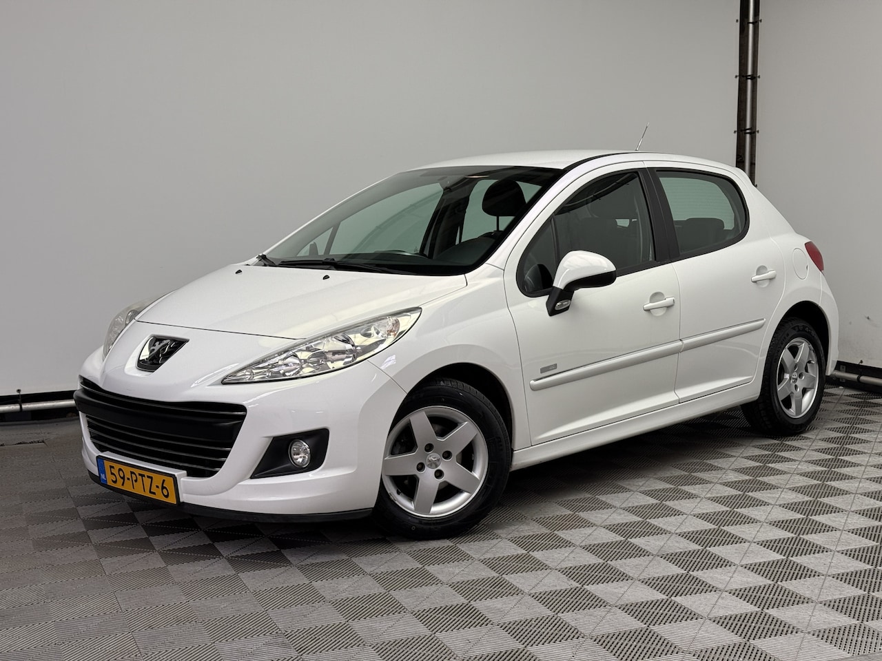 Peugeot 207 - 1.4 VTi Millesim 200 5-drs Airco LM15" NL Auto - AutoWereld.nl