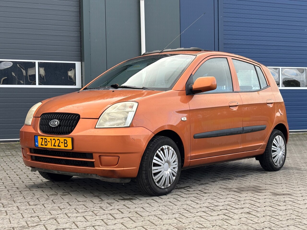 Kia Picanto - 1.1 LX Panoramadak - AutoWereld.nl