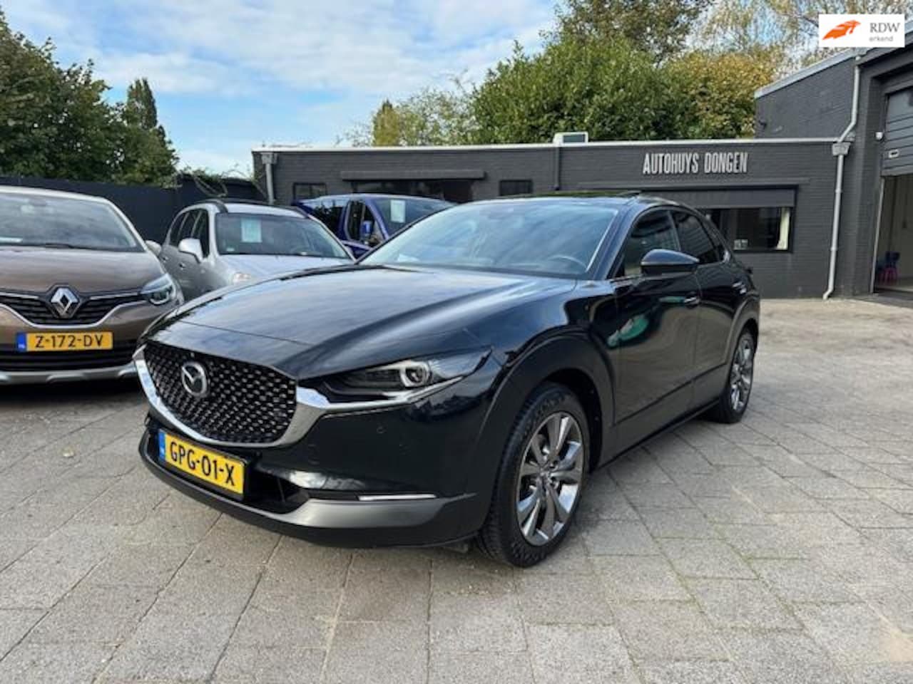 Mazda CX-30 - 2.0 e-SkyActiv-X M Hybrid (186pk) Aut 100th Anniv. Ed. Elek S Dak - AutoWereld.nl