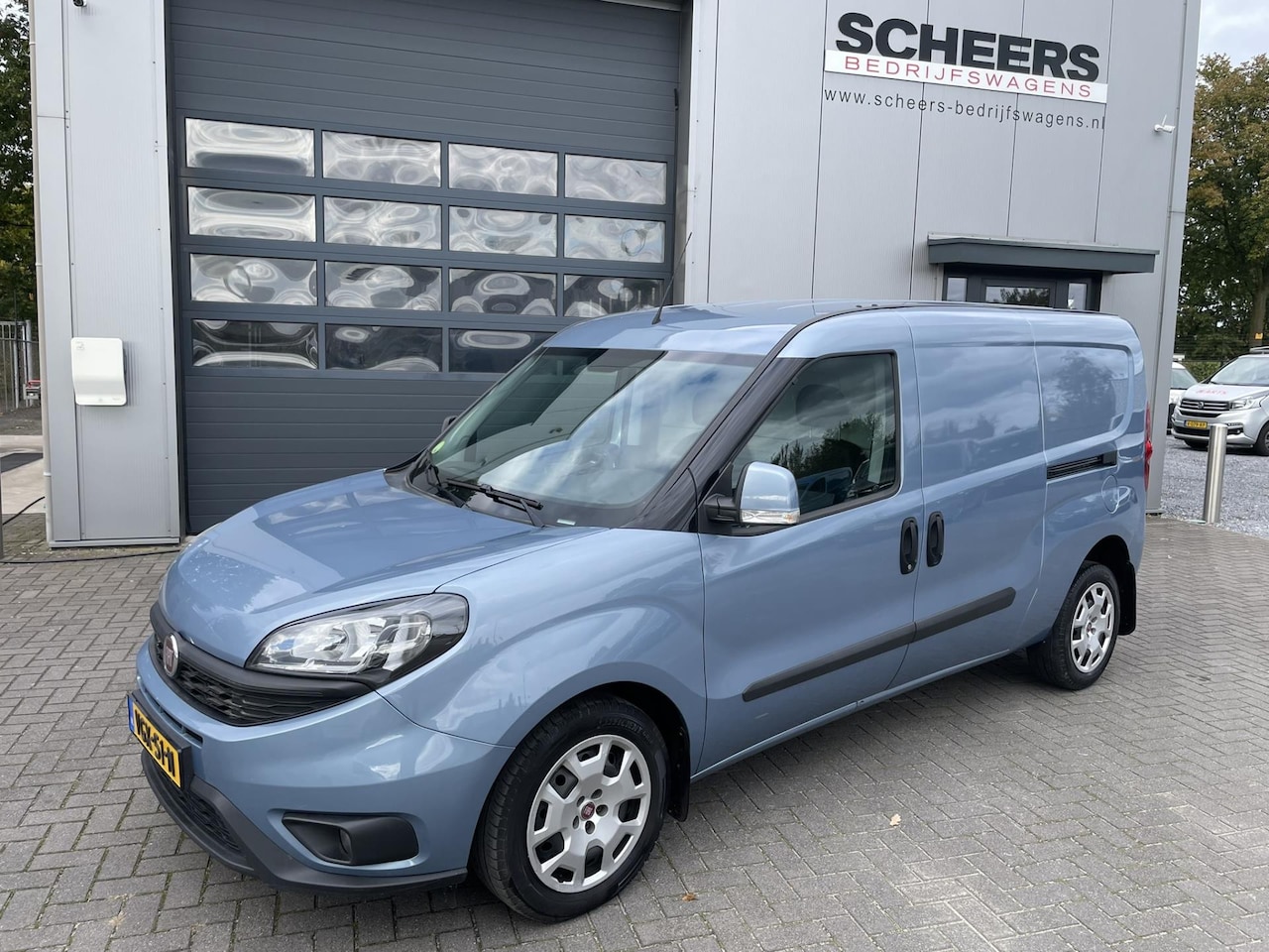 Fiat Doblò Cargo - 1.6 MJ 120PK L2H1 SX Airco | Navigatie - AutoWereld.nl