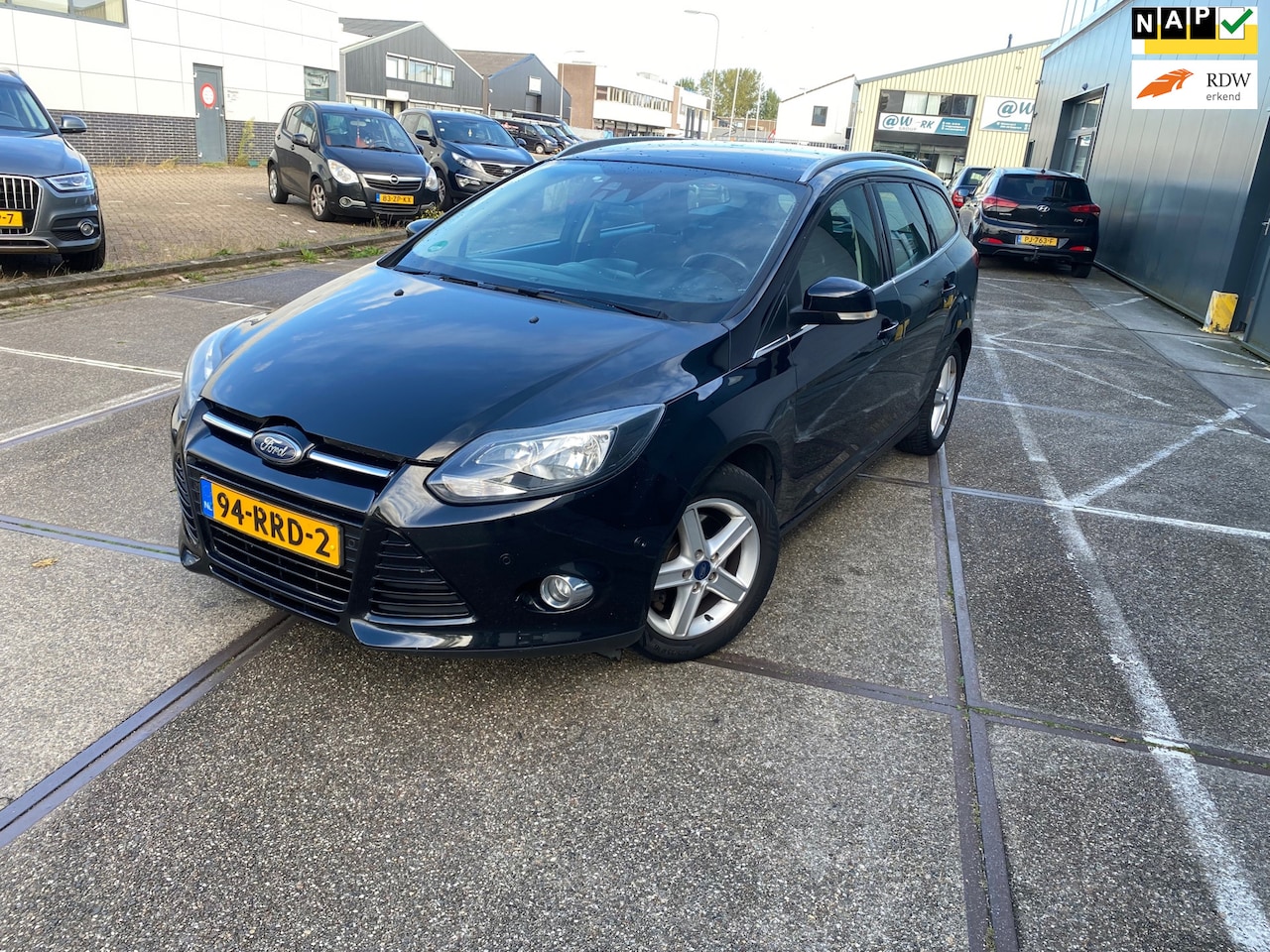 Ford Focus Wagon - 1.6 EcoBoost Titanium/5drs/3E EIG/NAP/1jaar apk/parkeersensoren/navi/dealeronderhouden/zee - AutoWereld.nl