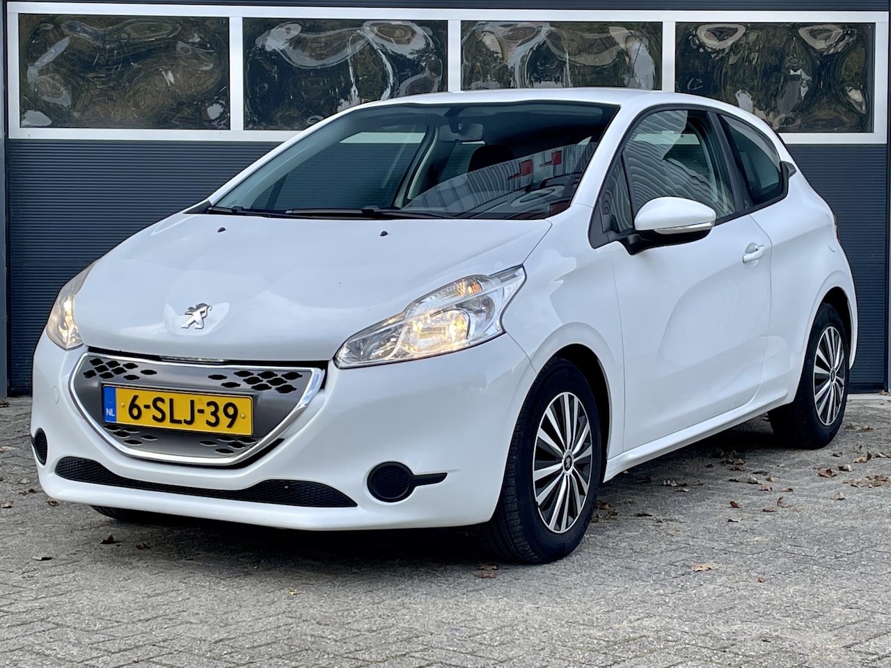 Peugeot 208 - 1.4 e-HDi Active | NL AUTO MET NAP | CLIMA | NAVI | BLUETOOTH | - AutoWereld.nl