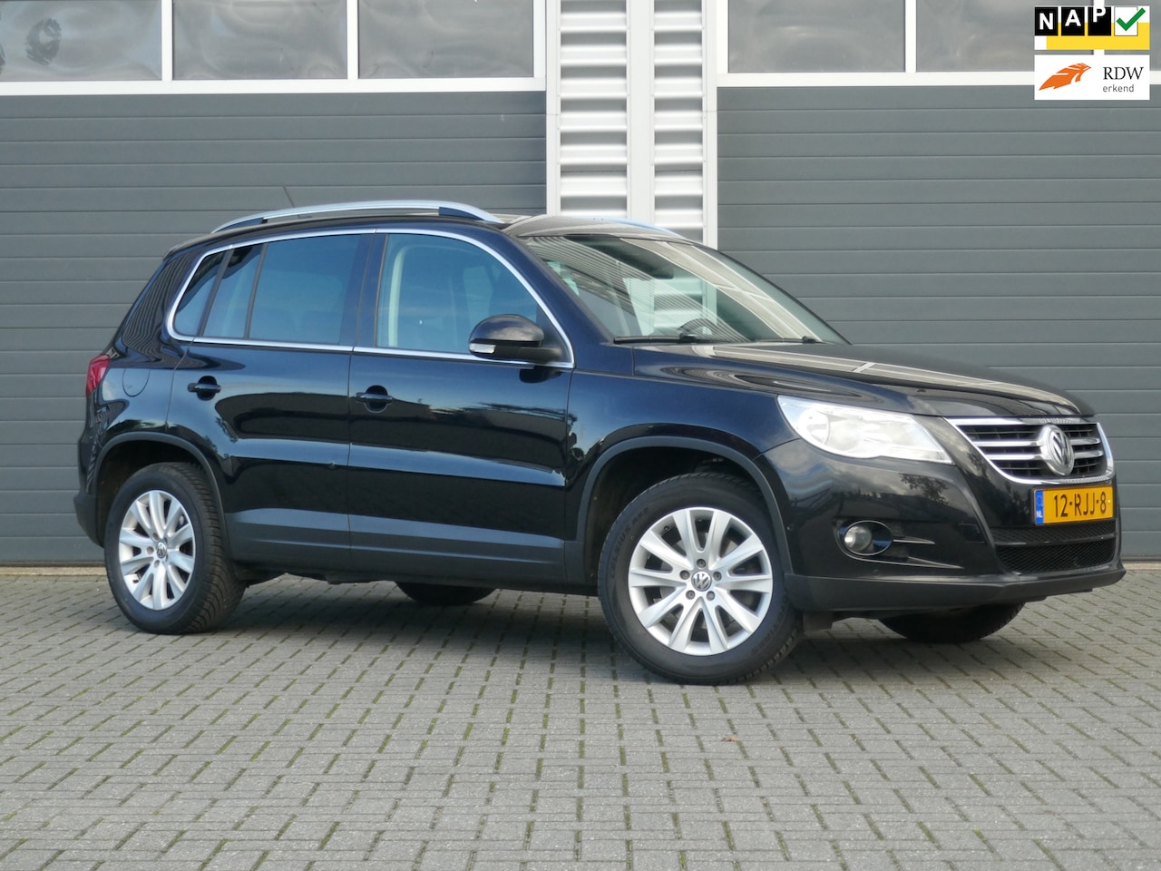 Volkswagen Tiguan - 1.4 TSI Sport&Style NAP/CRUISE/VOLLEDIG ONDERHOUD - AutoWereld.nl