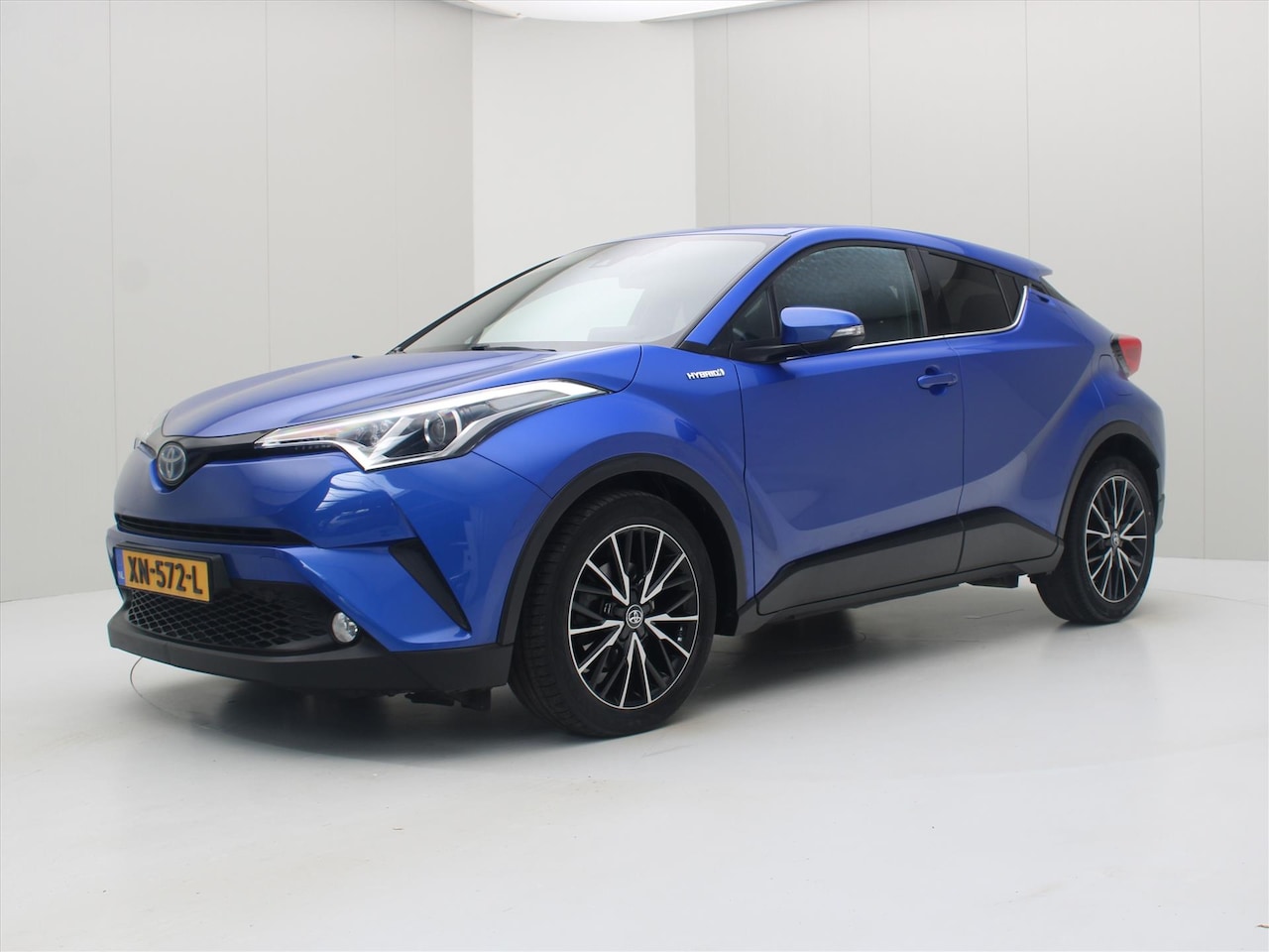 Toyota C-HR - 1.8 Hybrid 122pk CVT Dynamic [ CAMERA+STOELVERWARMING+CLIMAAT+CRUISE+PDC+NAVIGATIE ] - AutoWereld.nl