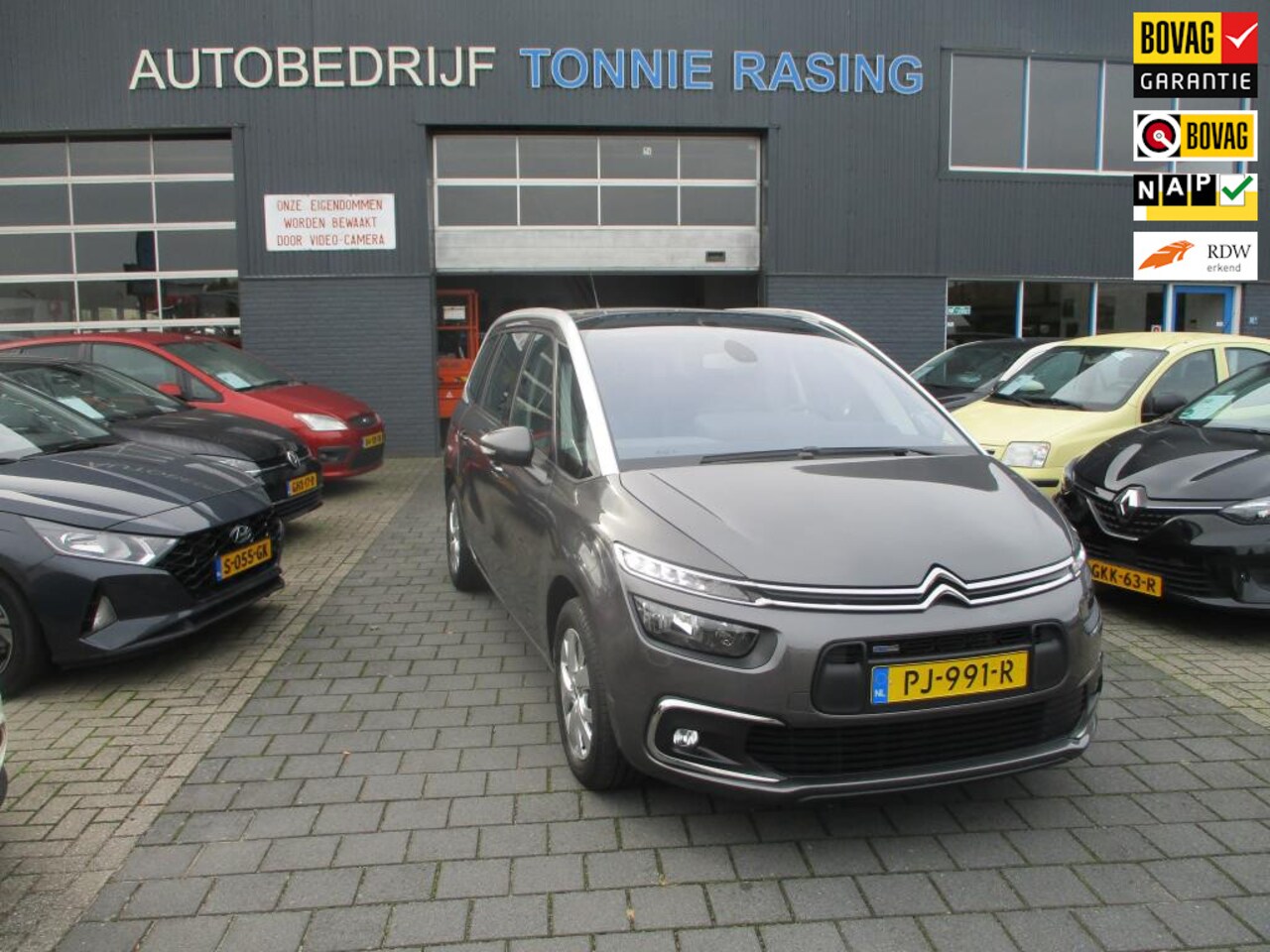 Citroën Grand C4 Picasso - 1.2 PureTech Business 1.2 PureTech Business,7 persoons uitvoering - AutoWereld.nl