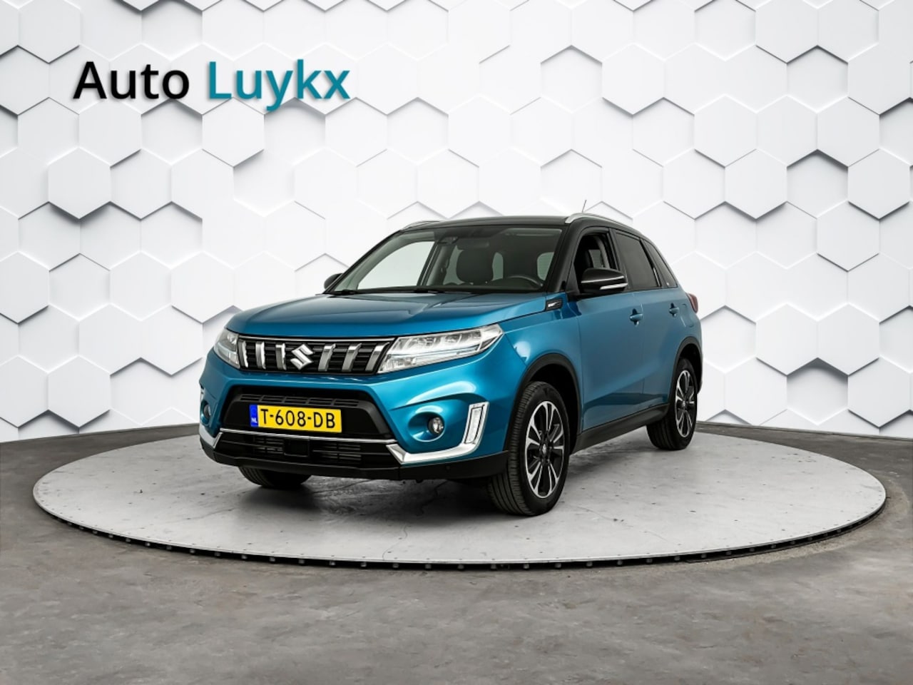 Suzuki Vitara - 1.4 Boosterjet Style Smart Hybrid | Navigatie | Lederen Bekleding | Keyless Entry - AutoWereld.nl