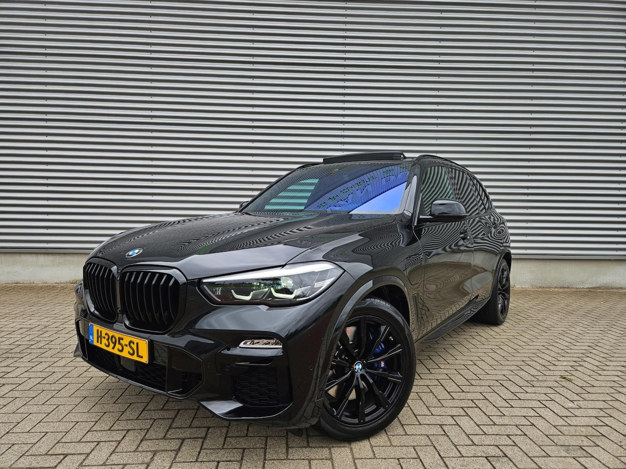 BMW X5 - XDrive45e M Sport 394pk Panodak Luchtvering Massage stoelen Camera Harman Kardon Sfeerverl - AutoWereld.nl