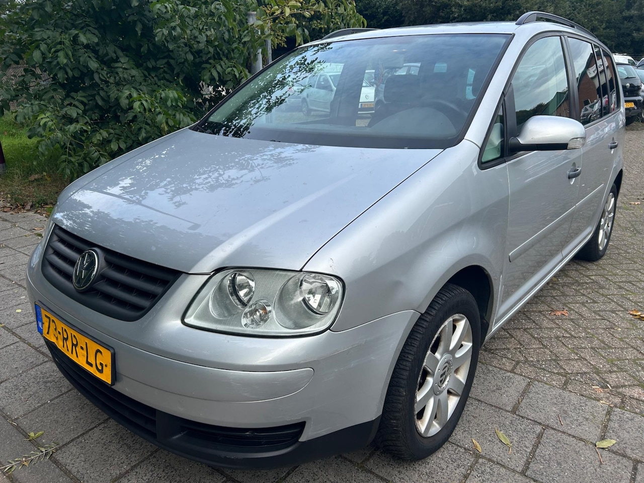 Volkswagen Touran - 7 persoon ,Lm velgen, Airco - AutoWereld.nl