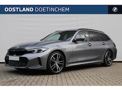 BMW 3-serie Touring - 318i High Executive M Sport Automaat / Panoramadak / Trekhaak / Sportstoelen / Stoelverwar