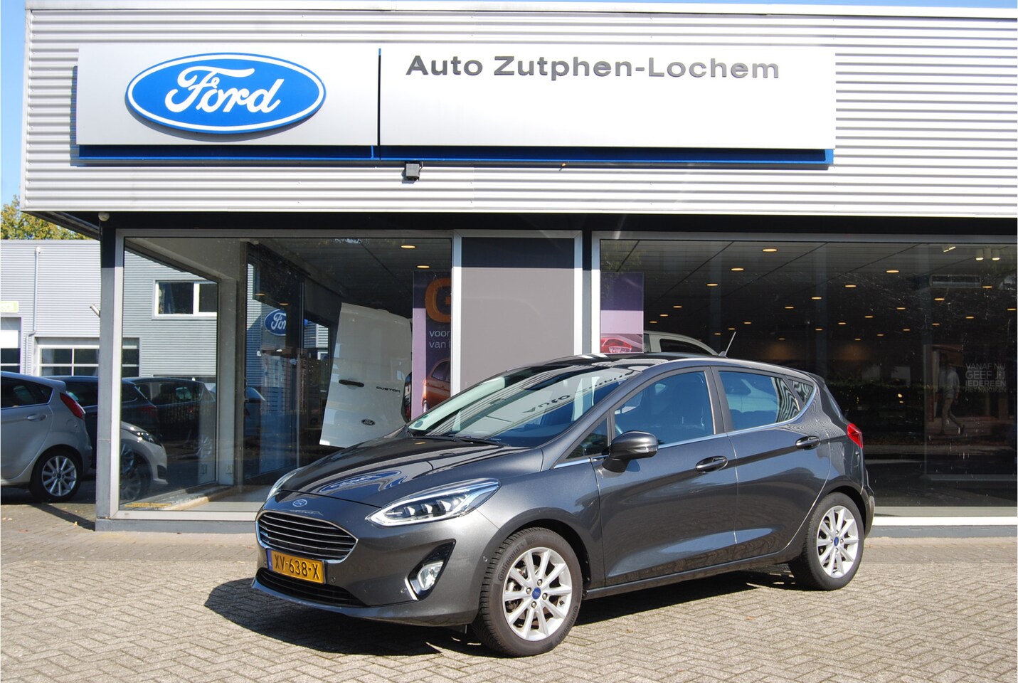 Ford Fiesta - 1.0 EcoBoost Titanium NL-AUTO | NAVIGATIE | CAMERA | STOEL/STUUR/VOORRUITVERWARMING | ALL - AutoWereld.nl