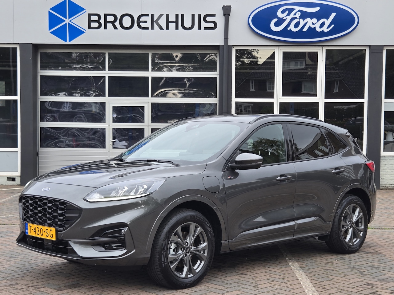 Ford Kuga - Ford Kuga Ford Kuga 2.5 PHEV ST-LINE | ORIGINEEL NL! | WINTERPACK | CAMERA | STANDVERWARMI - AutoWereld.nl