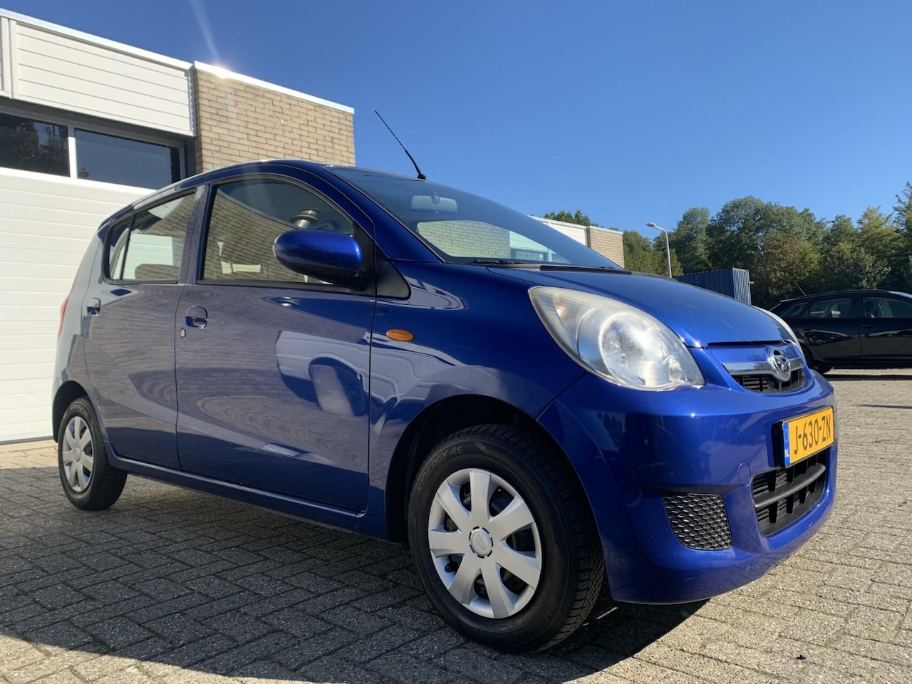 Daihatsu Cuore - 1.0 Premium Automaat NWE APK Airco Elektrische ramen - AutoWereld.nl