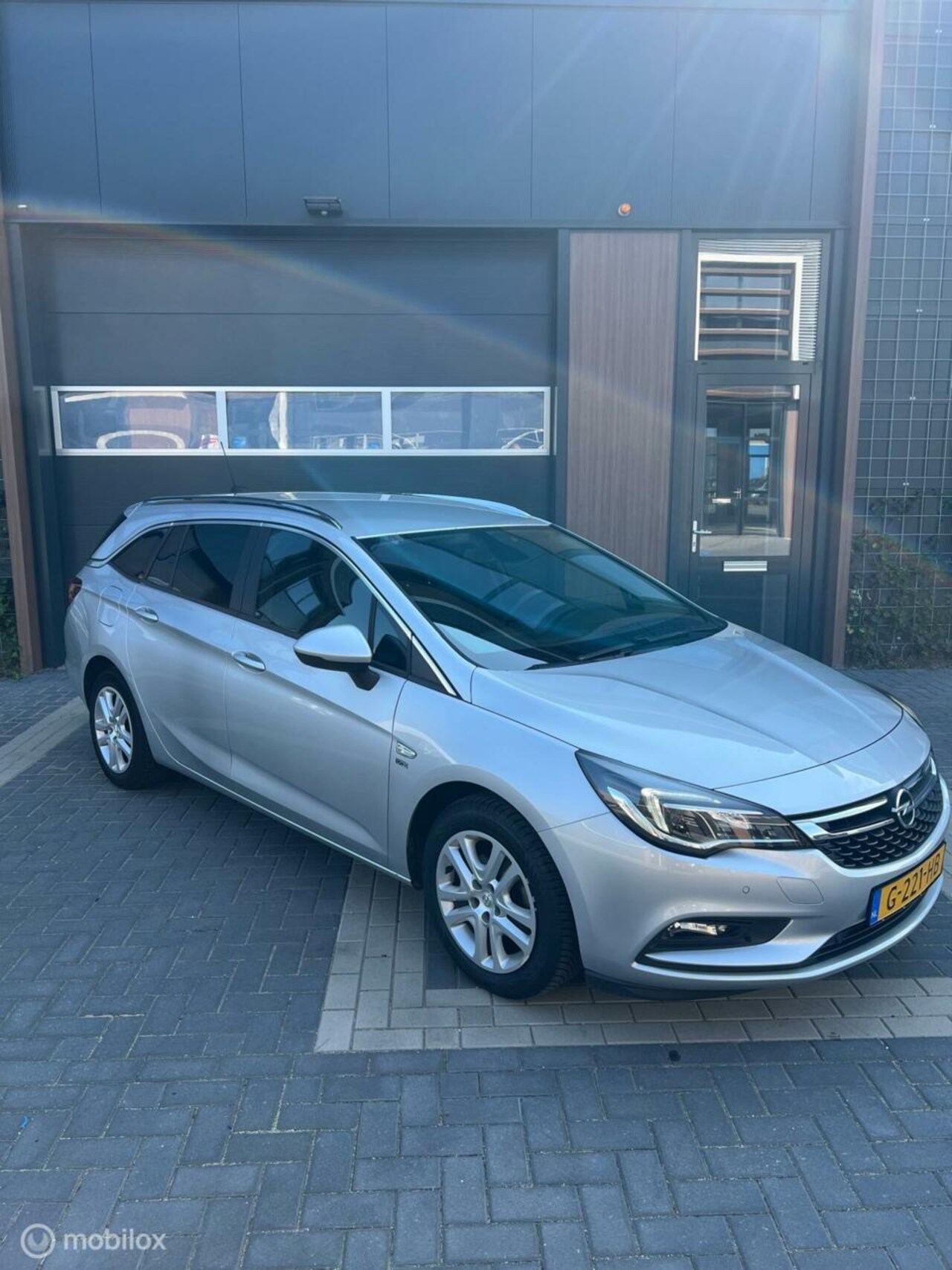 Opel Astra Sports Tourer - 1.0 Turbo 120 Jaar Edition 1.0 Turbo 120 Jaar Edition - AutoWereld.nl