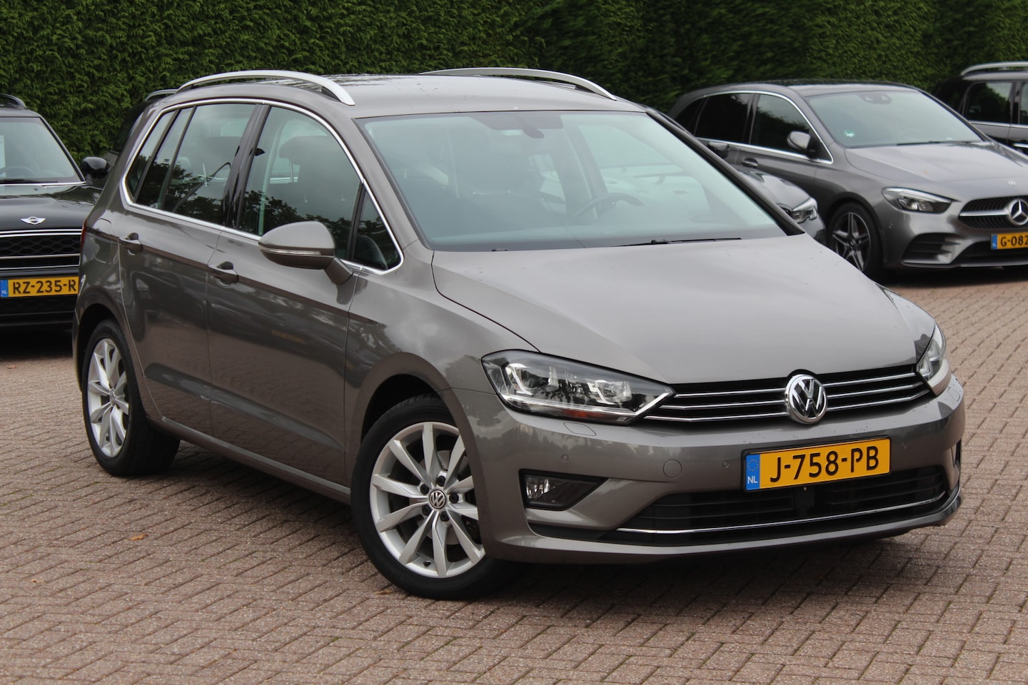 Volkswagen Golf Sportsvan - 1.4 TSI Highline / Trekhaak / Navigatie / Parkeerhulp V+A / Stoelverwarming / Cruise Contr - AutoWereld.nl