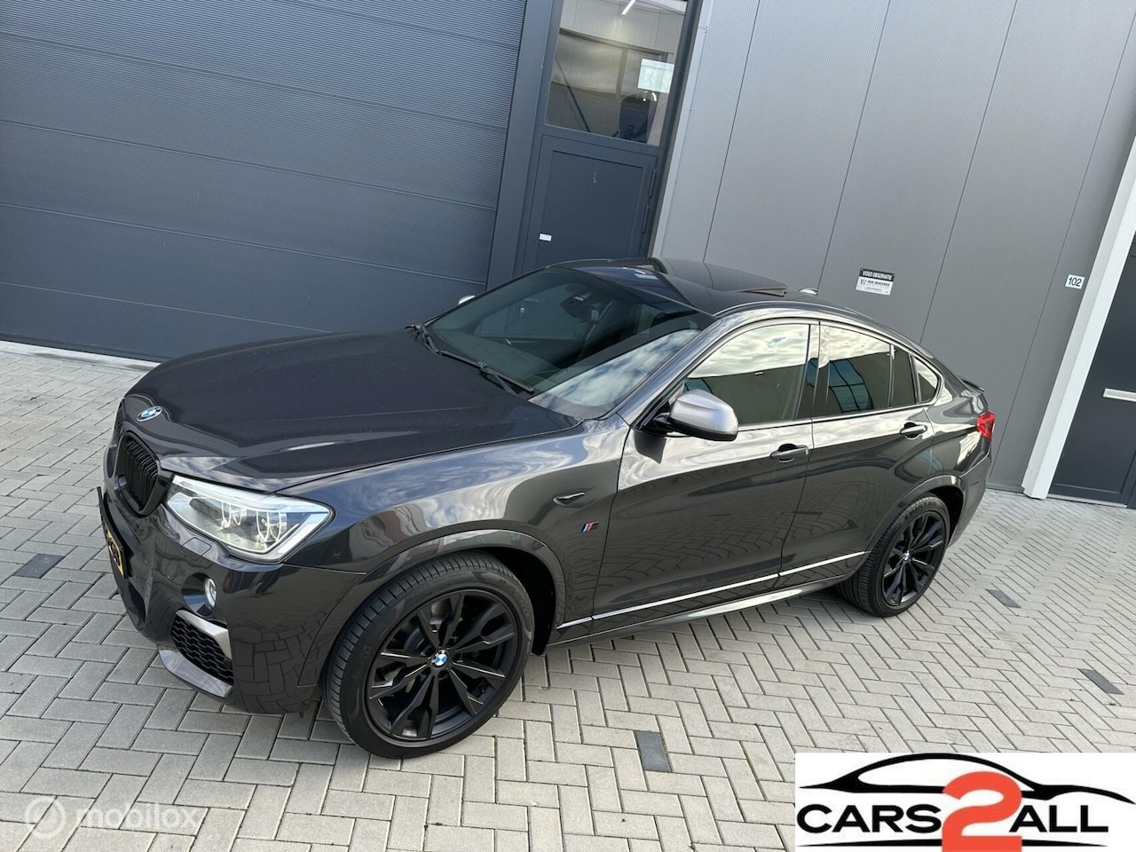 BMW X4 - M40i SCHUIFDAK HEADUP HARMEN / KARDON - AutoWereld.nl