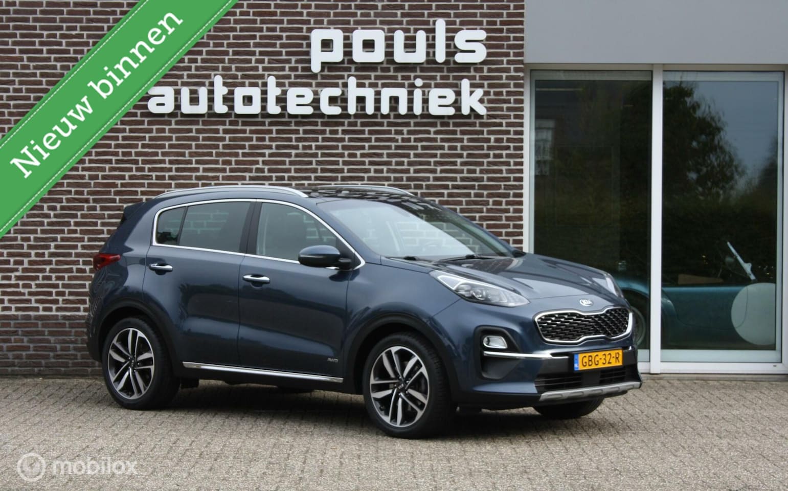 Kia Sportage - 1.6 T-GDI Panoramadak, trekhaak - AutoWereld.nl