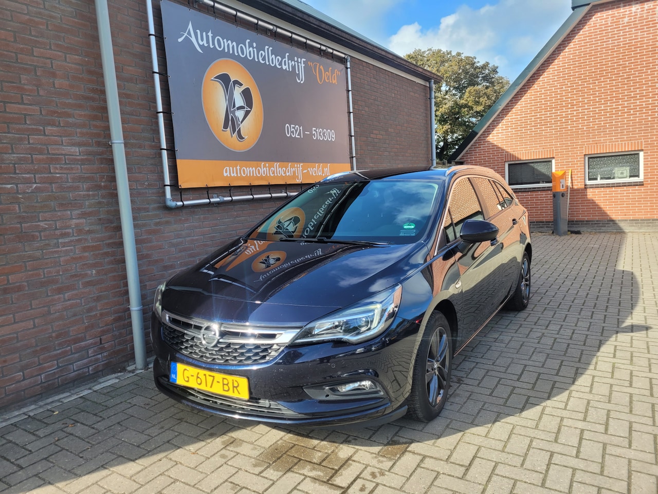 Opel Astra Sports Tourer - 1.4 Turbo 120 Jaar Edition 1.4 Turbo 120 Jaar Edition - AutoWereld.nl